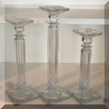 D05. Set of 3 glass candle stands. 